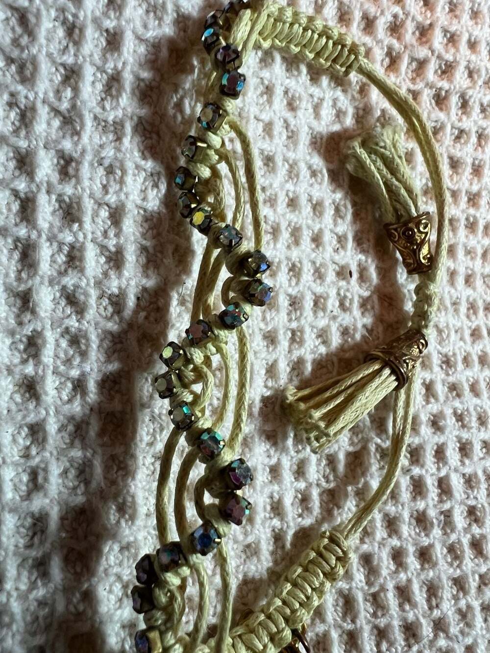 Rose Gonzalez Macrame Cord Bracelet with AB Rhinestones and Gold Tone Charms